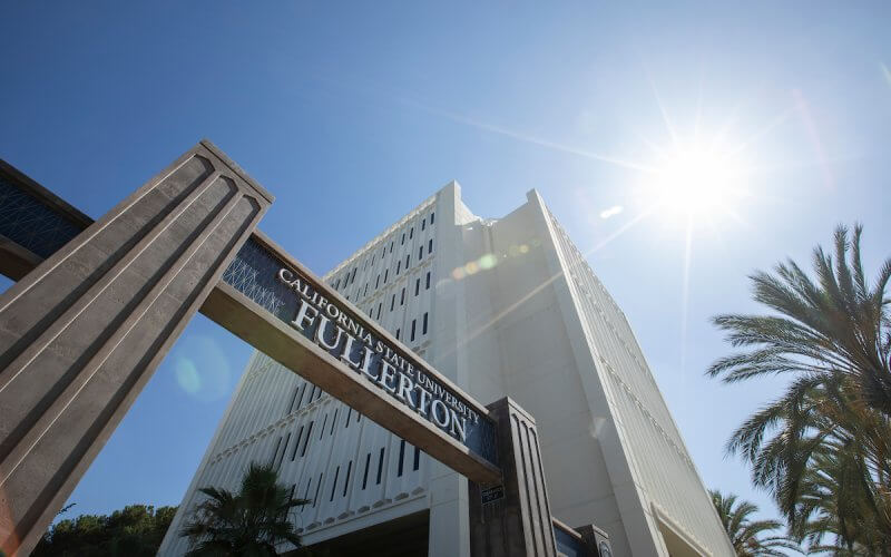 cal state fullerton sign infront of Lunsford Hall