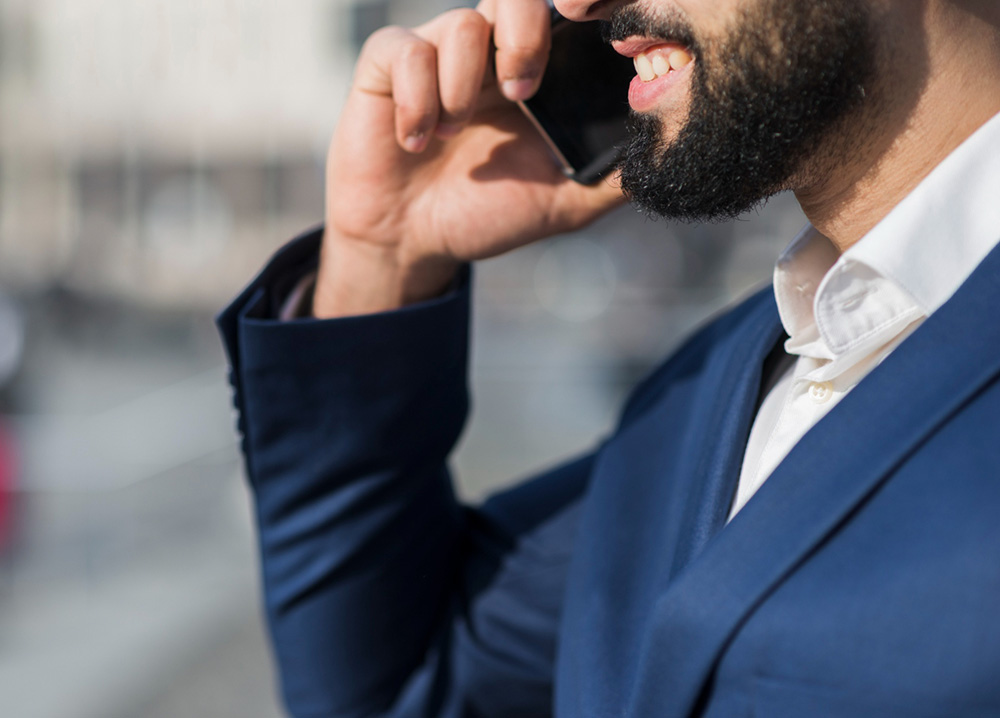 a man talking on a cell phone