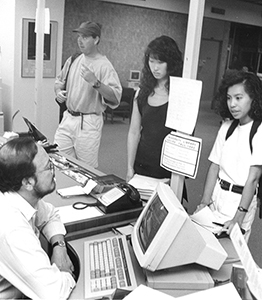 Students talking to librarians