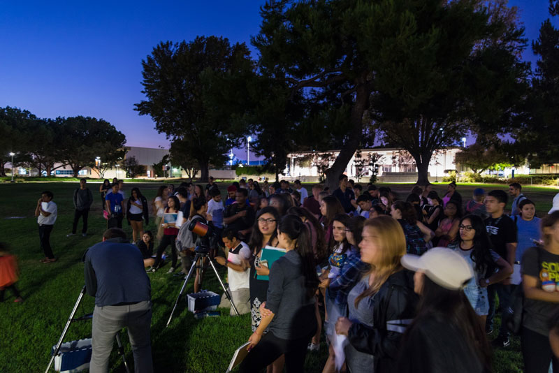 students gathered for viewing at night